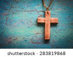 Image Of Wooden Cross On Blue...