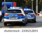 Small photo of 07.11.2023 wroclaw, poland, In the evening, a police car of the Polish police on the alarm siren.