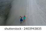 Small photo of Phuket, Thailand, 24, June, 2023: Tourists walk along the famous spit at low tide, tourists on a popular spit with tourists at low tide, tourism in Thailand