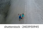 Small photo of Phuket, Thailand, 24, June, 2023: Tourists walk along the famous spit at low tide, tourists on a popular spit with tourists at low tide, tourism in Thailand