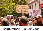 Small photo of Melbourne, Victoria Australia - November 20 2021: Man holds up a sign stating The Mainstream Media Feeds you Fear and Lies, on Bourke Street at the Freedom March and Kill the Bill peaceful protest