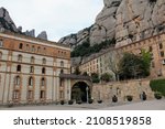 View of Santa Maria de Montserrat, an abbey located on the mountain of Montserrat in Monistrol de Montserrat. Catalunia, Spain.