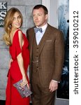 Small photo of Guy Ritchie and Jacqui Ainsley at the Los Angeles Premiere of "Sherlock Holmes: A Game Of Shadows" held at the Regency Village Theatre in Los Angeles, USA on December 6, 2011.