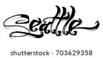 seattle. modern calligraphy... | Shutterstock .eps vector #703629358