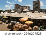 Small photo of Belem, Para, Brazil, January 2023. The canvas roof of the Ver o Peso market, some old buildings in the background