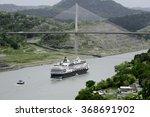 Large cruise ship passing under Panama