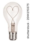 Small photo of Classic incandescent light bulb with heart made of wire isolated on white background. Love concept with symbol of romance and idea photo