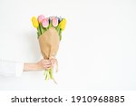 Woman's Hand With A Bouquet Of...