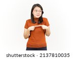 Small photo of Shy Awkward and pointing finger Together Of Beautiful Asian Woman Isolated On White Background