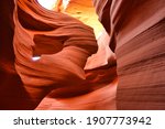 Lady in the wind in lower Antelope Canyon (Arizona)