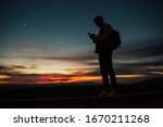 silhouette of young man with... | Shutterstock . vector #1670211268