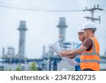 Small photo of Two engineer working at power plant,Work together happily,Help each other analyze the problem,Consult about development guidelines