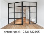 Small photo of glass partition separate living space and entrance hall in new renovated apartment. glass door in empty room with modern interior. concept of apartment with smart solution for space organization