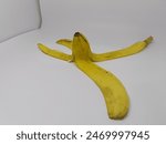 A banana peel spread out on a...