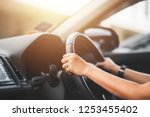 Close Up of Woman Driving a Car on Road - Transportation Concept