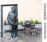 Small photo of Saint Petersburg, Russia - August 17, 2021: Monument to famous Russian journalist and writer Sergei Dovlatov on Rubinstein street.