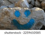 Smile Face Painted On Rock