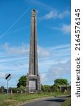 Small photo of Portchester, England, May 26th 2022. Nelson monument on Portsdown hill overlooking Portsmouth in England. 19th century monument to Horatio Nelson and his famous naval battles.