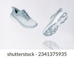 Small photo of Strasbourg, France - August 2023 : Hoka Bondi 8 new green running shoes on white background antigravity and reflection. Stylish monochrome shoes for active people that incorporate new health