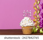 Small photo of Birthday Cake With Candle Number 271 - On Pink Background.