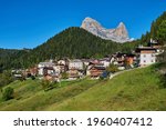 Italy. Veneto. Zoppe die Cadore. Landscape of a small mountain village. A big mountain (Pelmo) is in the background.
