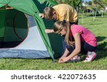 A Boy With A Girl Pitch A Tent