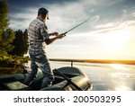 Mature man fishing from the...