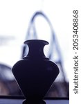 Small photo of An antonia black wooden vessel