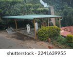 Small photo of Ooty, Tamilnadu, India- December 4, 2022: Private Gas station inside the Chamraj tea factory located on the main road via ooty to coonoor