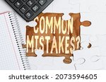 Small photo of Hand writing sign Common Mistakes Question. Business idea repeat act or judgement misguided making something wrong Building An Unfinished White Jigsaw Pattern Puzzle With Missing Last Piece