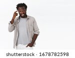 Small photo of Think about it. Guy insist you should make choices wisely. Attractive smiling, happy african-american man grinning, pointing at temple or brain and gazing camera, hear clever advice