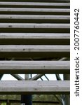 Old gray wooden stairs. Diagonal lines. Abstraction. From big to small stripes. High quality photo