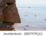 big rocks boulders pile on sea background. High quality photo