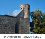 Old fortress tower against blue sky. High quality photo