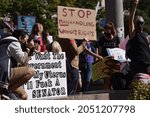 Small photo of Washington, DC, USA - October 2, 2021: Woman Holds a Sign That Says, “Stop Manhandling Women’s Rights” at the Women’s March at Freedom Plaza