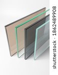 Small photo of Sheets of Factory manufacturing tempered clear float glass panels cut to size.