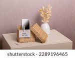 Smartphone is in separate wicker box with inscription digital detox. Refuse using digital gadgets at home in favor of live communication with your family