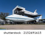 Small photo of Houston, Texas, USA - March 12, 2022: Boeing 747-123 â€�N905NAâ€™ with replica Space Shuttle Orbiter â€śIndependenceâ€ť at Independence Plaza in Space Center Houston, Texas, USA on March 12, 2022.