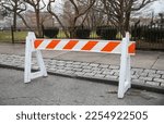 Small photo of construction cones middle of street roadblock danger orange