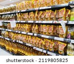 Small photo of AEON Supermarket, Jakarta, 2022 - February 7, 2022: cooking oil on display shelf in supermarket sold at the same price according to Indonesian government policy