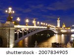 Small photo of The bridge Alexandre III was offered to France by the Emperor Alexandre III of Russia to mark the Franco-Russian Alliance. It was inaugurated in 1900 at the Universal Exhibition. Paris. France.