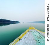Small photo of View of unending Hasdeo-Bango reservoir from a boat. The water is deep with jungle surrounding all sides.