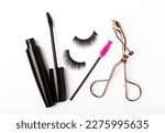 Mascara brushes,eyelash curler and false eyelashes isolated on white background. Makeup brushes makeup kits.Disposable brush for eyelashes and eyebrows.Close-up.