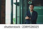 Small photo of Handsome 38 years old gentle asian man, wearing glasses, formal slick hairstyle, in a modern office building beside a huge window