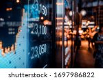 Small photo of Financial stock exchange market display screen board on the street, selective focus