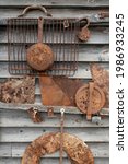 Old Rusty Items On Wooden Wall. ...