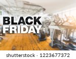 Black friday poster. Place for text. Blurry gym on background