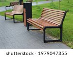 wooden benches in the park after the rain