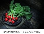 A Bunch Of Fresh Radishes In A...