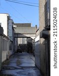 Small photo of Limerick Ireland - 01 29 2022: Hunts laneway with arch bridge from the tait center